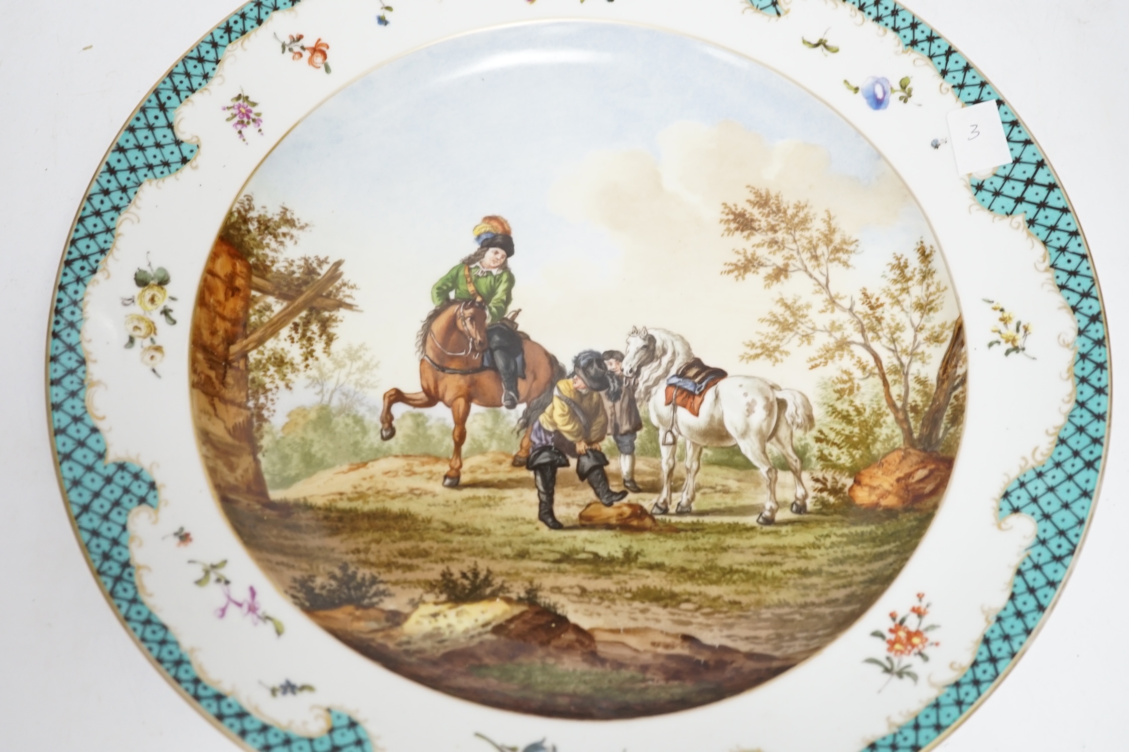A Meissen style dish decorated with a hunting party, 35.5cm diameter